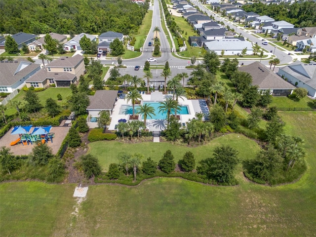 birds eye view of property with a residential view