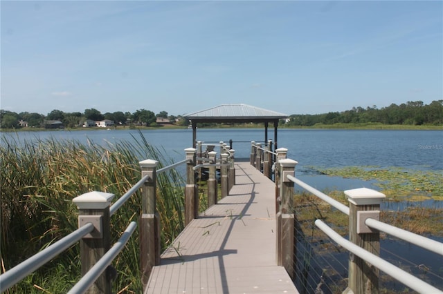 dock area featuring a gazebo and a water view