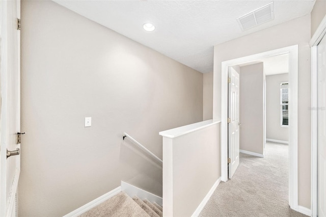 5004 Ashford Falls Ln, Oviedo, FL 32765 - hallway featuring an upstairs landing, carpet floors, baseboards, and recessed lighting