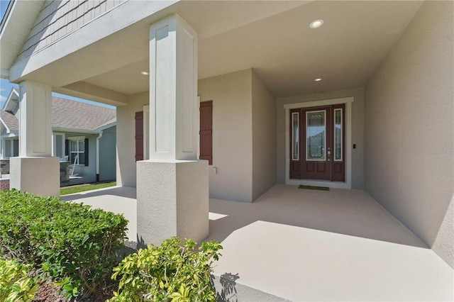 5829 Valentino Way, Lakeland, FL 33812 - property entrance with stucco siding
