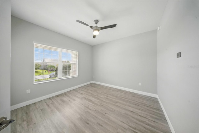 5829 Valentino Way, Lakeland, FL 33812 - empty room with baseboards and wood finished floors