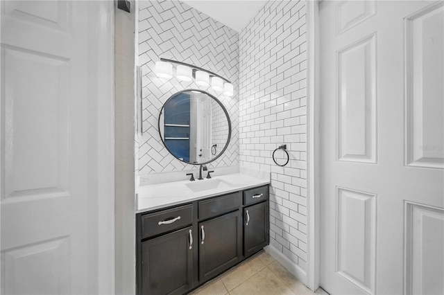 5829 Valentino Way, Lakeland, FL 33812 - bathroom with tile walls, tasteful backsplash, vanity, and tile patterned floors