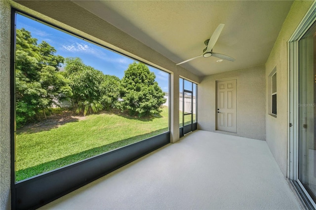 5829 Valentino Way, Lakeland, FL 33812 - unfurnished sunroom featuring a ceiling fan