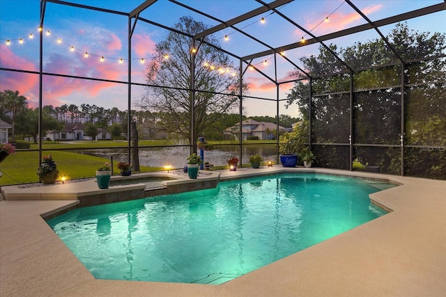 10664 Emerald Chase Dr, Orlando, FL 32836 - pool at dusk featuring a water view, a patio, an outdoor pool, and glass enclosure