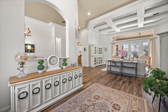 10664 Emerald Chase Dr, Orlando, FL 32836 - interior space with arched walkways, dark wood finished floors, beamed ceiling, french doors, and coffered ceiling