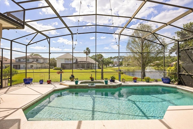 10664 Emerald Chase Dr, Orlando, FL 32836 - view of swimming pool with a patio, a yard, a pool with connected hot tub, and glass enclosure