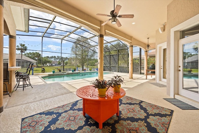 10664 Emerald Chase Dr, Orlando, FL 32836 - outdoor pool with a patio, glass enclosure, and a ceiling fan