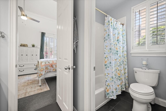 10664 Emerald Chase Dr, Orlando, FL 32836 - bathroom featuring tile patterned floors, connected bathroom, toilet, shower / bathtub combination with curtain, and ceiling fan