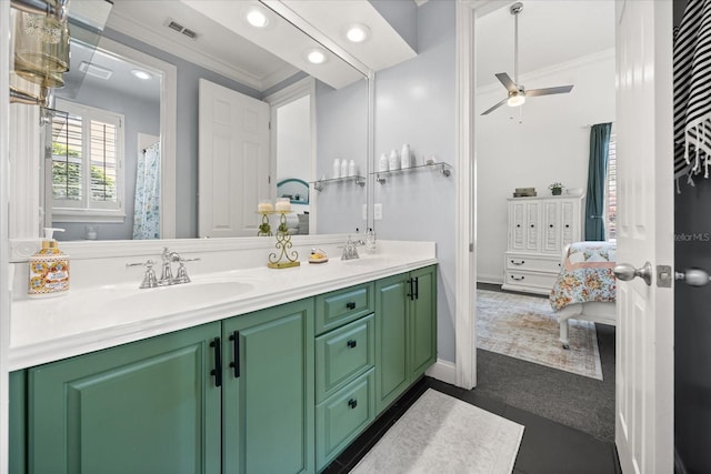 10664 Emerald Chase Dr, Orlando, FL 32836 - bathroom featuring visible vents, a sink, ornamental molding, ceiling fan, and double vanity