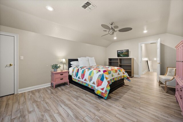 10664 Emerald Chase Dr, Orlando, FL 32836 - bedroom featuring light wood-style floors, visible vents, recessed lighting, lofted ceiling, and baseboards