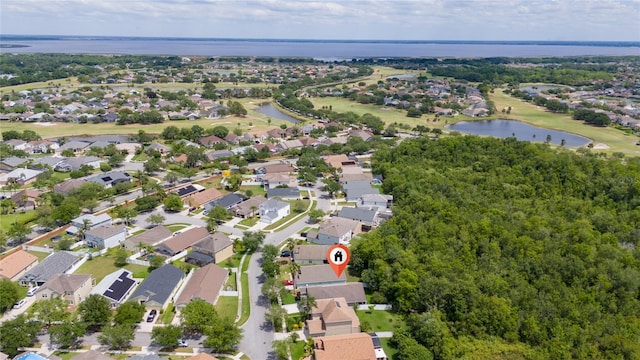 bird's eye view with a residential view and a water view