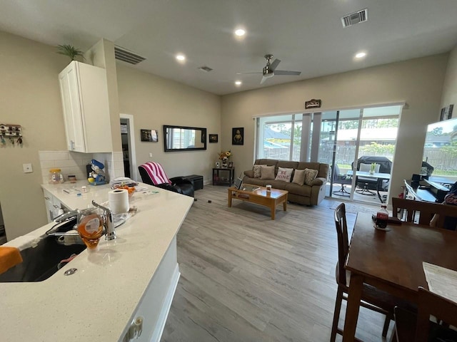 731 Triumph Dr, Sebring, FL 33872 - living room with a ceiling fan, light wood-style floors, and recessed lighting