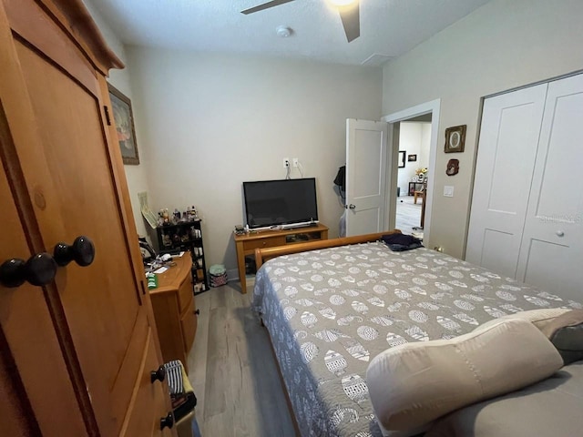 731 Triumph Dr, Sebring, FL 33872 - bedroom with light wood-style floors, ceiling fan, and a closet