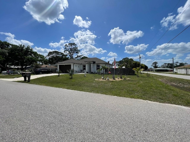 731 Triumph Dr, Sebring, FL 33872 - ranch-style house with a garage and concrete driveway