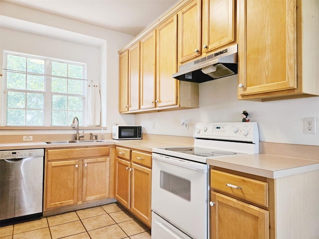 5421 Watervista Dr, Orlando, FL 32821 - kitchen featuring stainless steel dishwasher, under cabinet range hood, a sink, white electric stove, and light tile patterned floors