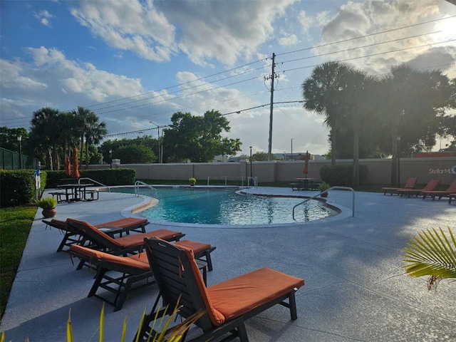 5421 Watervista Dr, Orlando, FL 32821 - pool with fence and a patio