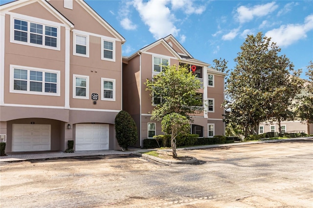 view of building exterior with an attached garage