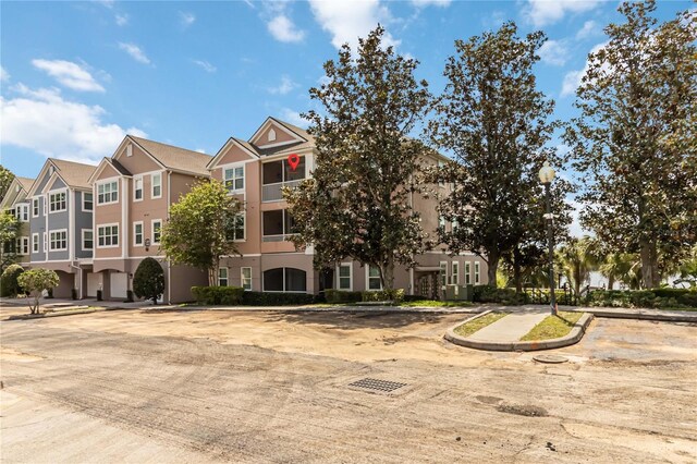 view of property with a residential view