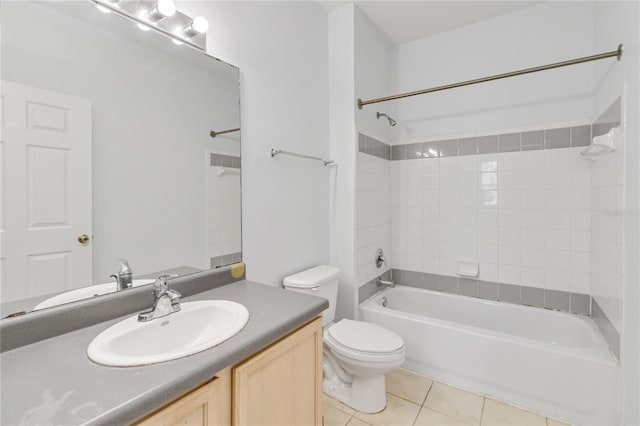 full bathroom featuring tile patterned flooring, vanity, toilet, and shower / bath combination