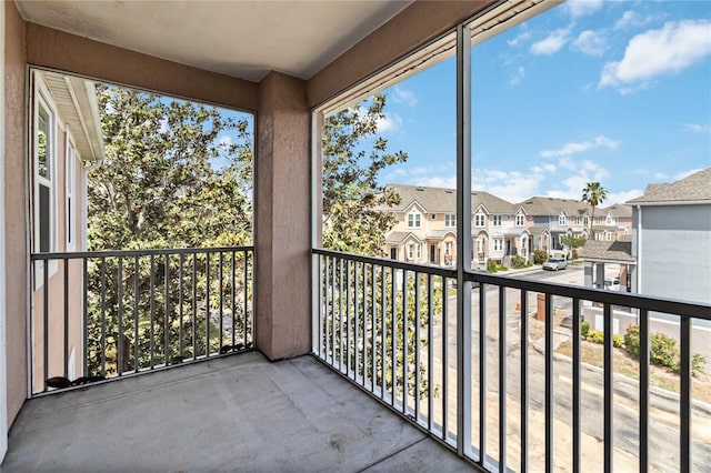 balcony featuring a residential view