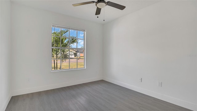 13838 Ginger Creek Blvd, Orlando, FL 32826 - unfurnished room featuring baseboards, ceiling fan, and wood finished floors