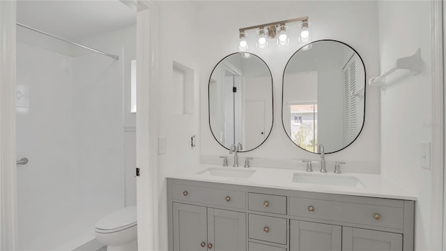 13838 Ginger Creek Blvd, Orlando, FL 32826 - bathroom featuring a shower, a sink, and toilet