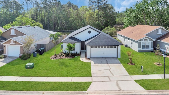 13838 Ginger Creek Blvd, Orlando, FL 32826 - ranch-style house featuring roof with shingles, concrete driveway, a garage, and a front lawn