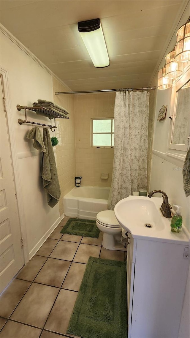 bathroom featuring shower / bath combo, tile patterned floors, vanity, and toilet