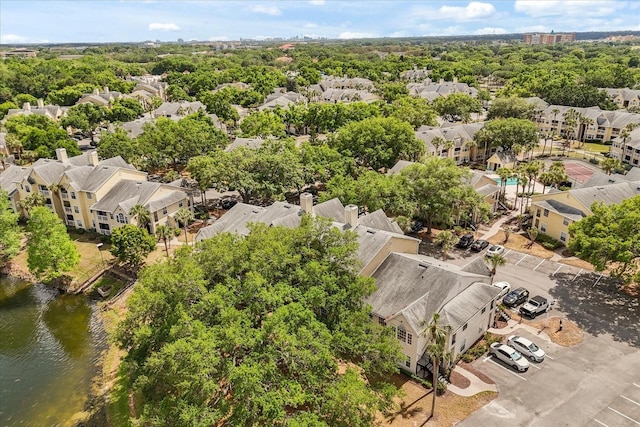 birds eye view of property with a residential view