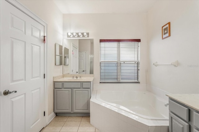 6959 Brescia Way, Orlando, FL 32819 - full bathroom with a bath, vanity, and tile patterned flooring