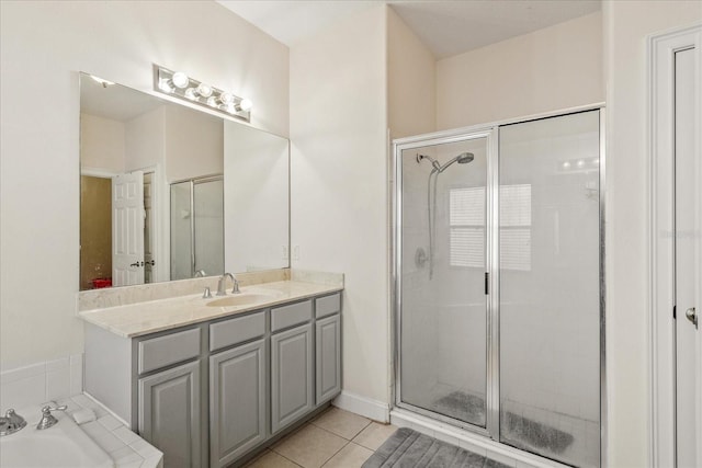 6959 Brescia Way, Orlando, FL 32819 - full bath with vanity, tile patterned flooring, and a stall shower