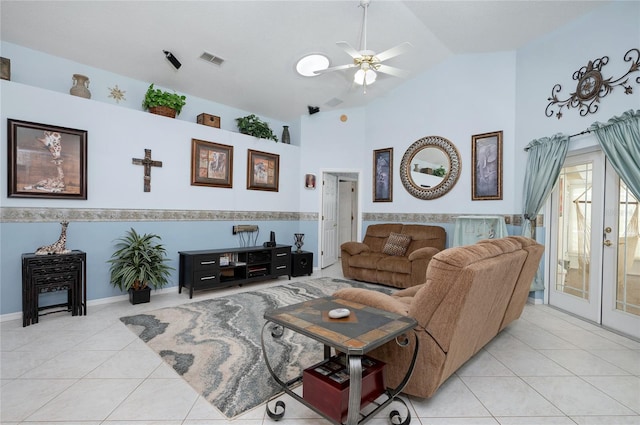 living room with high vaulted ceiling, light tile patterned floors, visible vents, and ceiling fan