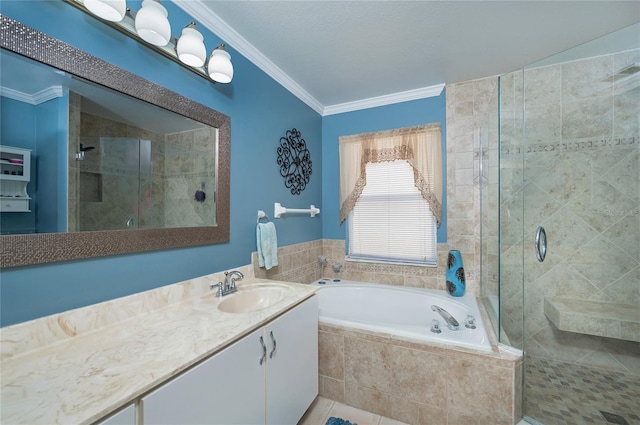 bathroom featuring a shower stall, a bath, vanity, and ornamental molding