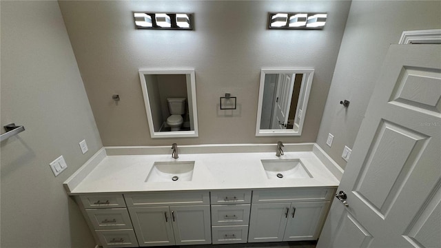 7908 Pine Glen Rd, Sebring, FL 33876 - bathroom with double vanity and toilet