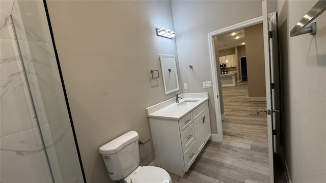 7908 Pine Glen Rd, Sebring, FL 33876 - bathroom with vanity and wood finished floors