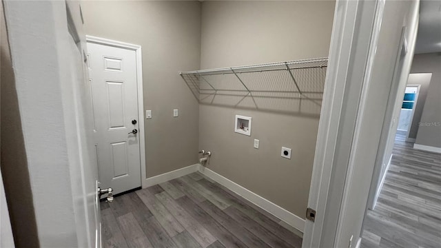 7908 Pine Glen Rd, Sebring, FL 33876 - laundry room with hookup for a washing machine, wood finished floors, and electric dryer hookup