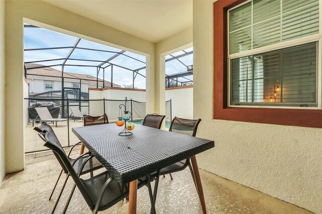 1571 Plunker Dr, Davenport, FL 33896 - view of patio with glass enclosure and outdoor dining space