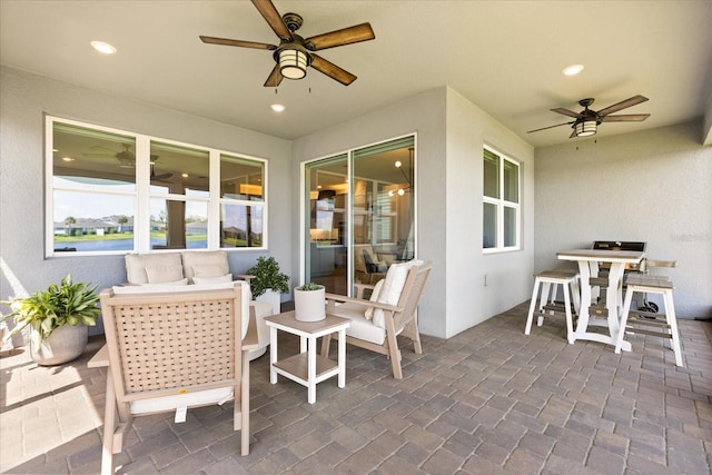 view of patio / terrace with ceiling fan