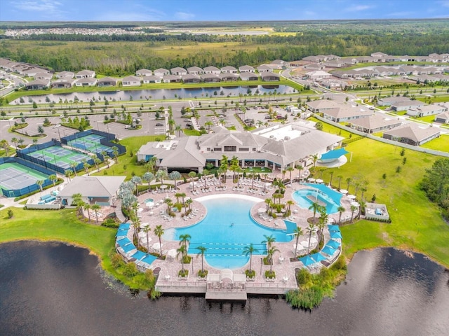 aerial view featuring a water view and a residential view