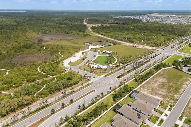 aerial view featuring a forest view