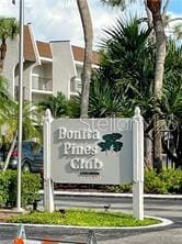 25806 Cockleshell Dr Unit 314, Bonita Springs, FL 34135 - view of community / neighborhood sign
