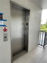 25806 Cockleshell Dr Unit 314, Bonita Springs, FL 34135 - exterior space with elevator