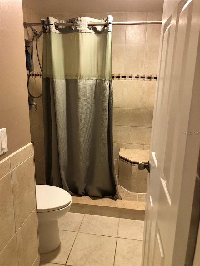 25806 Cockleshell Dr Unit 314, Bonita Springs, FL 34135 - bathroom with tile patterned floors, toilet, and a shower stall