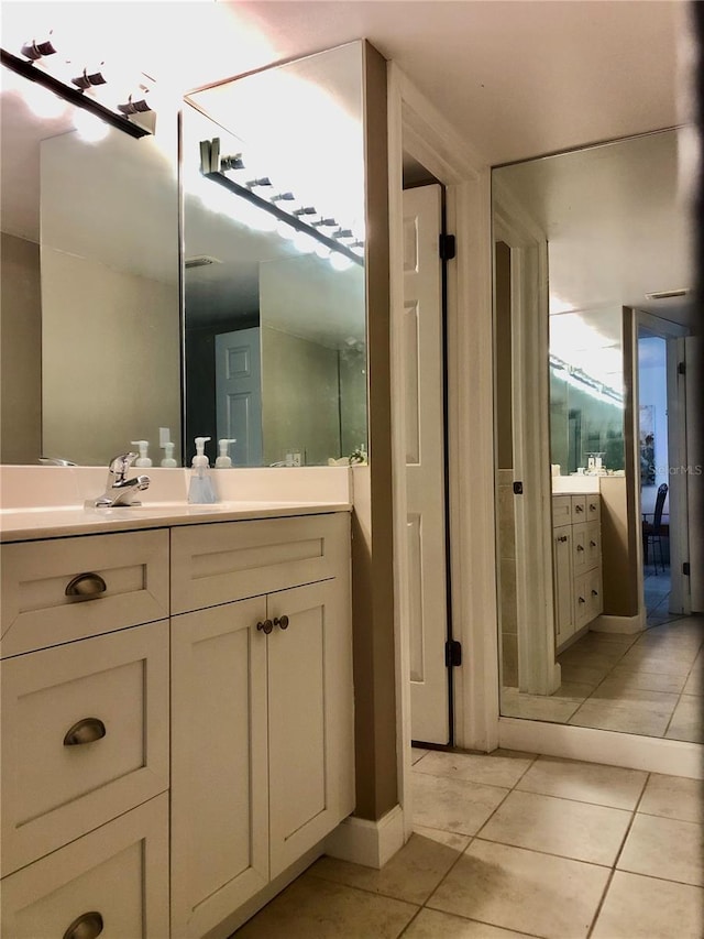25806 Cockleshell Dr Unit 314, Bonita Springs, FL 34135 - bathroom with vanity and tile patterned flooring