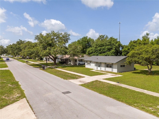 14796 SW 39th Cir, Ocala, FL 34473 - view of front of house featuring a front lawn and stucco siding
