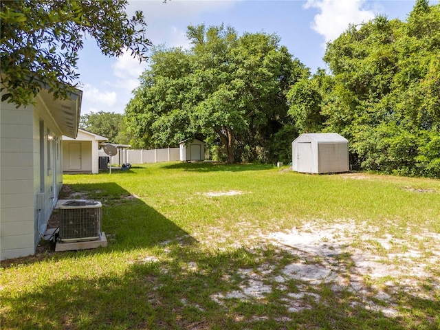14796 SW 39th Cir, Ocala, FL 34473 - view of green lawn featuring a storage shed