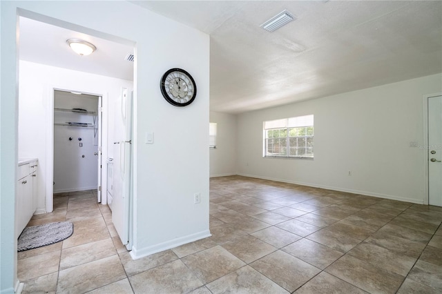14796 SW 39th Cir, Ocala, FL 34473 - corridor with baseboards and light tile patterned floors