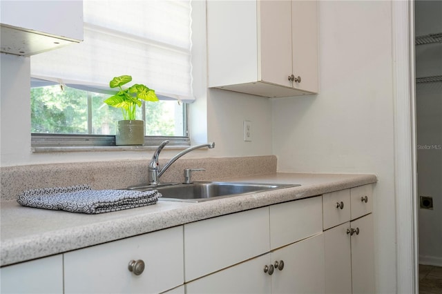 14796 SW 39th Cir, Ocala, FL 34473 - kitchen with light countertops and white cabinets
