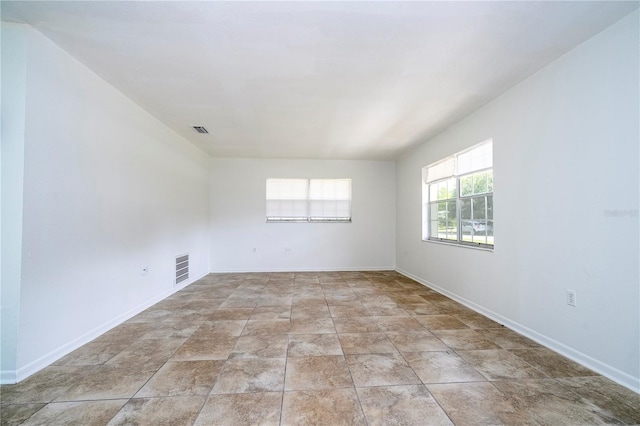 14796 SW 39th Cir, Ocala, FL 34473 - unfurnished room with baseboards