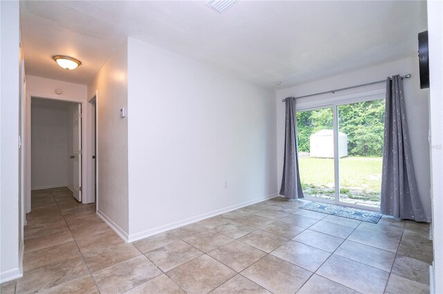 14796 SW 39th Cir, Ocala, FL 34473 - unfurnished room featuring light tile patterned flooring